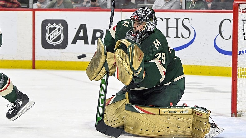 Apr 11, 2023; Saint Paul, Minnesota, USA;  Minnesota Wild goalie Marc-Andre Fleury (29) makes a glove save against the Winnipeg Jets during the third period at at Xcel Energy Center. Mandatory Credit: Nick Wosika-USA TODAY Sports