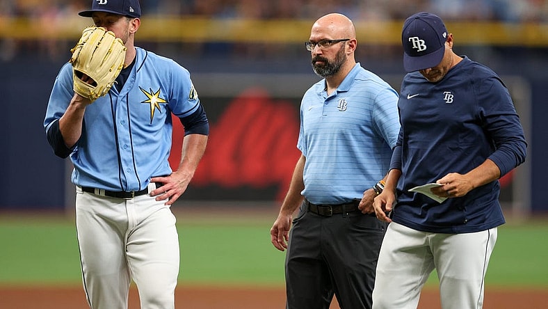 Apr 13, 2023; St. Petersburg, Florida, USA;  Tampa Bay Rays starting pitcher Jeffrey Springs (59) reacts after having to leave the game against the Boston Red Sox in the fourth inning at Tropicana Field. Mandatory Credit: Nathan Ray Seebeck-USA TODAY Sports
