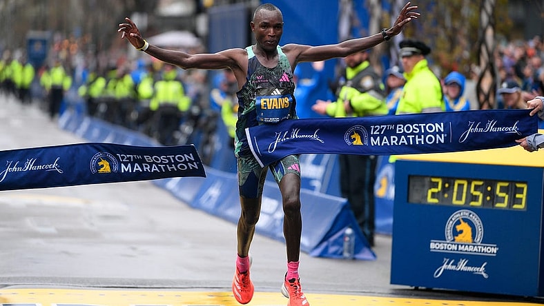 Apr 17, 2023; Boston, MA, USA; Evans Chebet of Kenya crosses the finish line to win the men's division at then 2023 Boston Marathon.  Mandatory Credit: Eric Canha-USA TODAY Sports