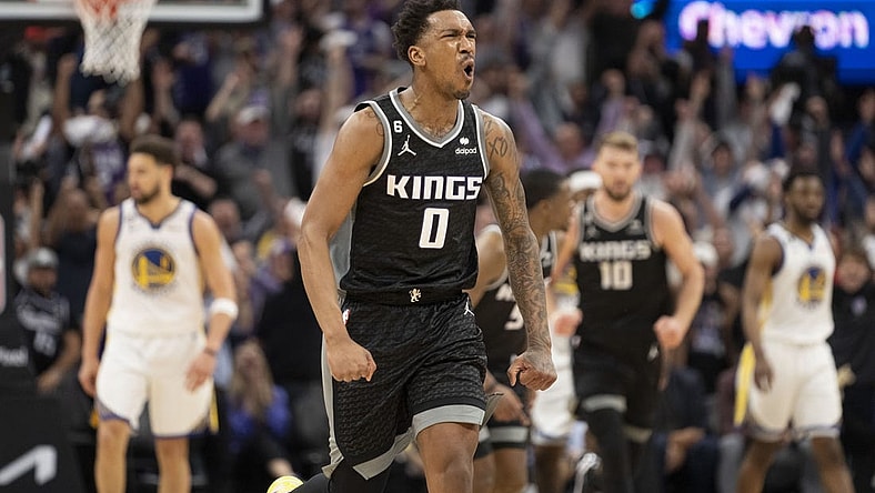 April 17, 2023; Sacramento, California, USA; Sacramento Kings guard Malik Monk (0) celebrates against the Golden State Warriors during the fourth quarter in game two of the first round of the 2023 NBA playoffs at Golden 1 Center. Mandatory Credit: Kyle Terada-USA TODAY Sports