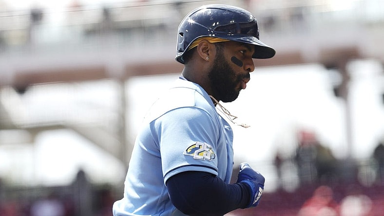 Apr 19, 2023; Cincinnati, Ohio, USA; Tampa Bay Rays first baseman Yandy Diaz (2) celebrates while running the bases after hitting a solo home run against the Cincinnati Reds during the first inning at Great American Ball Park. Mandatory Credit: David Kohl-USA TODAY Sports