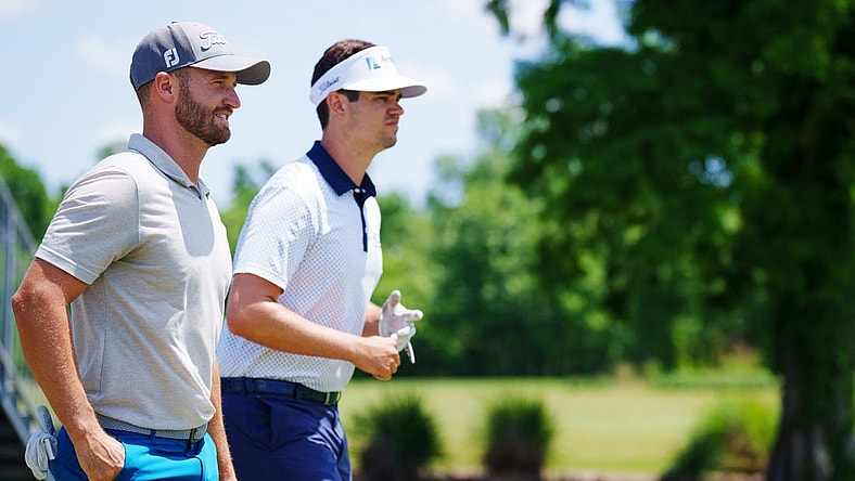 Apr 20, 2023; Avondale, Louisiana, USA; Wyndham Clark and Beau Hossler walk off the first tee during the first round of the Zurich Classic of New Orleans golf tournament. Mandatory Credit: Andrew Wevers-USA TODAY Sports