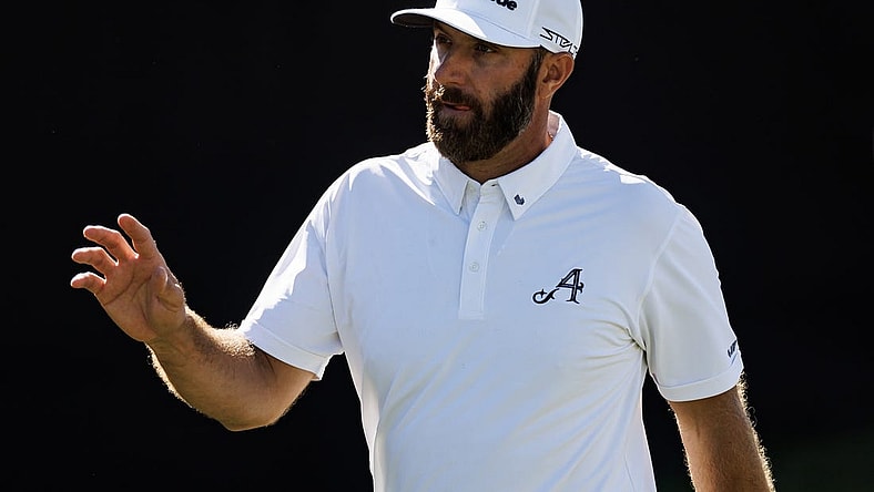 Apr 21, 2023; Adelaide, South Australia AUS;  Dustin Johnson of team Aces waves to the crowd on the twelfth hole during the first round of LIV Golf Adelaide golf tournament at Grange Golf Club. Mandatory Credit: Mike Frey-USA TODAY Sports