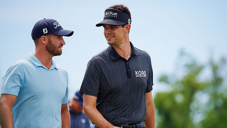 Apr 21, 2023; Avondale, Louisiana, USA; Wyndham Clark and Beau Hossler walk the eighth fairway during the second round of the Zurich Classic of New Orleans golf tournament. Mandatory Credit: Andrew Wevers-USA TODAY Sports