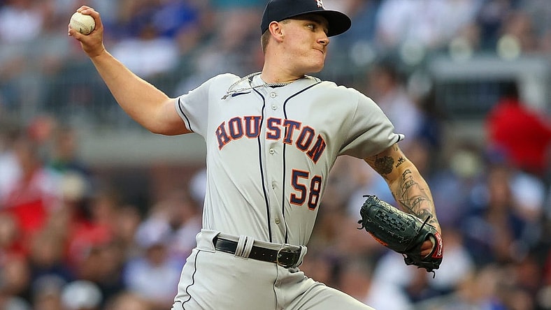 Apr 21, 2023; Atlanta, Georgia, USA; Houston Astros starting pitcher Hunter Brown (58) throws against the Atlanta Braves in the first inning at Truist Park. Mandatory Credit: Brett Davis-USA TODAY Sports