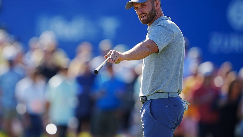 Apr 22, 2023; Avondale, Louisiana, USA; Wyndham Clark talks on the 18th green during the third round of the Zurich Classic of New Orleans golf tournament. Mandatory Credit: Andrew Wevers-USA TODAY Sports