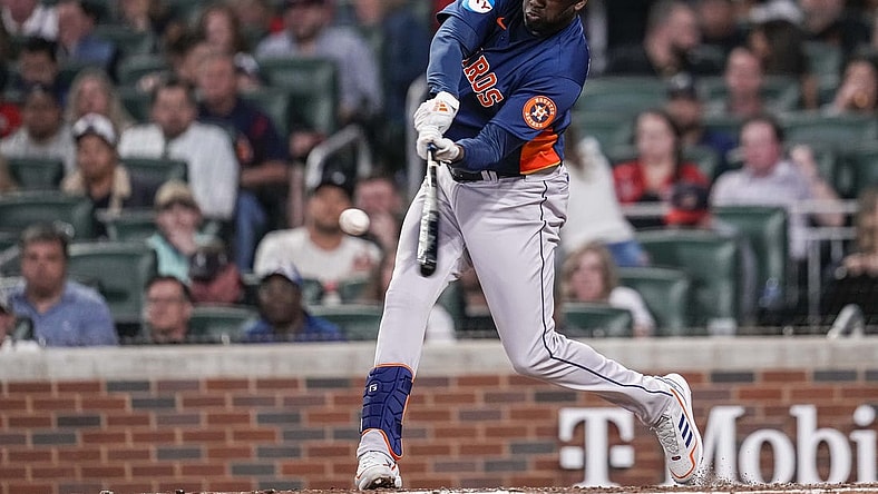Apr 22, 2023; Cumberland, Georgia, USA; Houston Astros designated hitter Yordan Alvarez (44) hits a two run home run against the Atlanta Braves during the sixth inning at Truist Park. Mandatory Credit: Dale Zanine-USA TODAY Sports