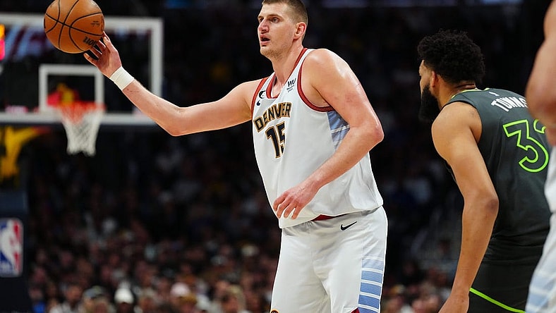 Apr 25, 2023; Denver, Colorado, USA; Denver Nuggets center Nikola Jokic (15) passes in the first half against the Minnesota Timberwolves in game five of the 2023 NBA Playoffs at Ball Arena. Mandatory Credit: Ron Chenoy-USA TODAY Sports