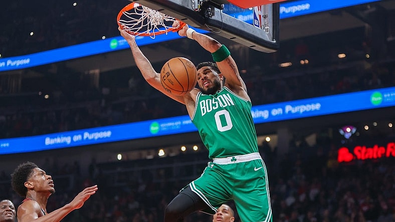 Apr 27, 2023; Atlanta, Georgia, USA; Boston Celtics forward Jayson Tatum (0) dunks the ball against the Atlanta Hawks in the first quarter during game six of the 2023 NBA playoffs at State Farm Arena. Mandatory Credit: Brett Davis-USA TODAY Sports