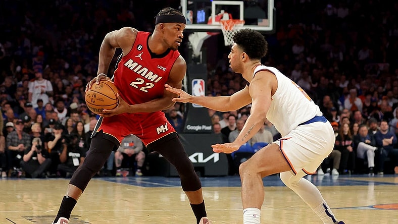 Apr 30, 2023; New York, New York, USA; Miami Heat forward Jimmy Butler (22) controls the ball against New York Knicks guard Quentin Grimes (6) during the second quarter of game one of the 2023 NBA Eastern Conference semifinal playoffs at Madison Square Garden. Mandatory Credit: Brad Penner-USA TODAY Sports
