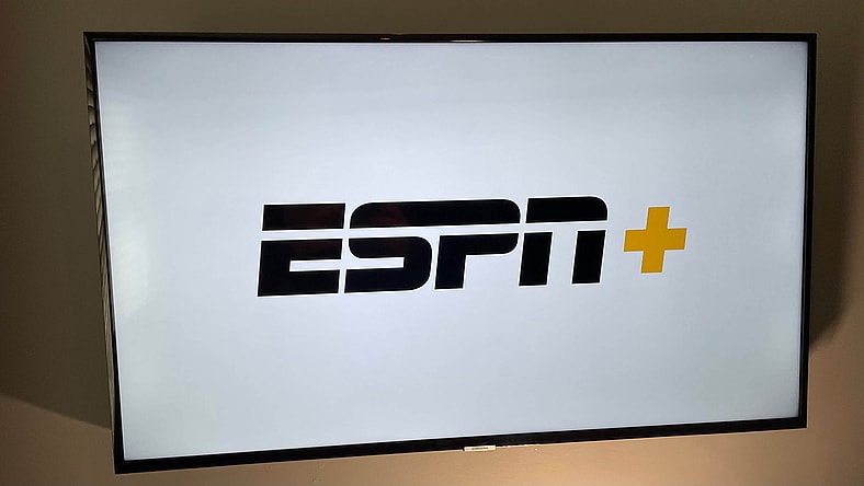 ESPN Plus logo on mounted flatscreen