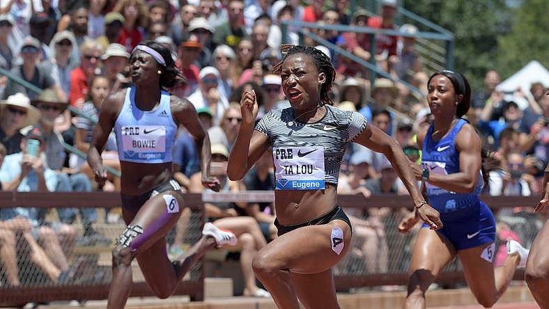 Jun 30, 2019; Stanford, CA, USA; Marie-Josee Ta Lou (CIV) defeats Tori Bowie (USA) and Shelly-Ann Fraser-Pryce (JAM) to win the women's 100m in 11.02 during the 45th Prefontaine Classic at Cobb Track & Angell Field. Mandatory Credit: Kirby Lee-USA TODAY Sports