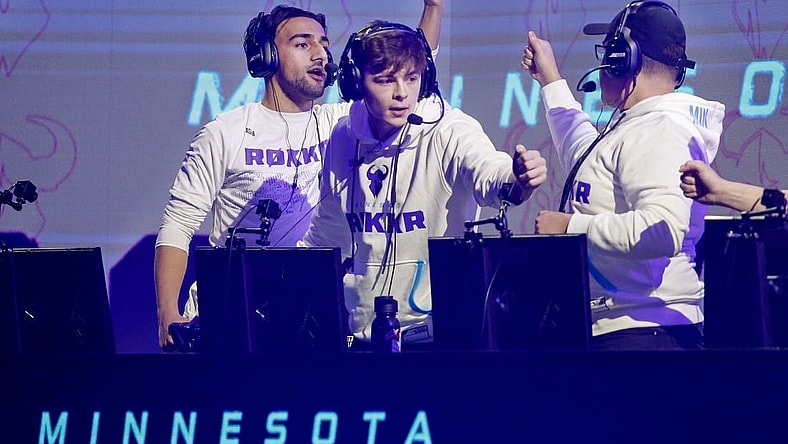 Jan 26, 2020; Minneapolis, Minnesota, USA; Obaid Asim and Alex Alexx Carpenter and Adam Assault Garcia of the Minnesota Rokkr celebrate after defeating the Toronto Ultra in a round during the Call of Duty League Launch Weekend at The Armory. Mandatory Credit: Bruce Kluckhohn-USA TODAY Sports