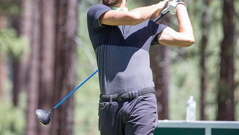 Stephen Curry swings during the ACC Golf Tournament at Edgewood Tahoe Golf Course in South Lake Tahoe on Saturday, July 11, 2020.