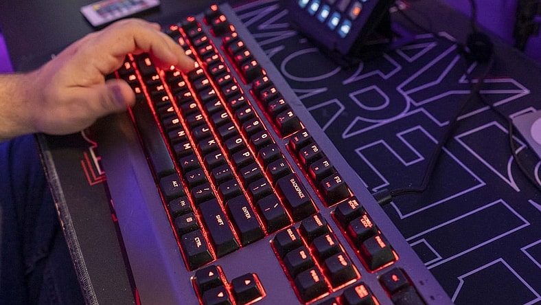 A backlit keyboard is part of the gear online video game streamer Jordan Woodruff uses in his Gilbert home.

Jordan Woodruff