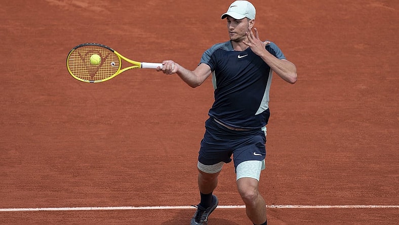 May 28, 2022; Paris, France; Miomir Kecmanovic (SRB) returns a shot from Daniil Medvedev during their match on day seven of the French Open at Stade Roland-Garros. Mandatory Credit: Susan Mullane-USA TODAY Sports