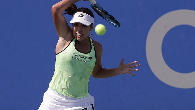 Aug 4, 2022; Washington, DC, USA;  Camila Osorio (COL) hits a forehand against Emma Raducanu (GBR) (not pictured) on day four of the Citi Open at Rock Creek Park Tennis Center. Mandatory Credit: Geoff Burke-USA TODAY Sports
