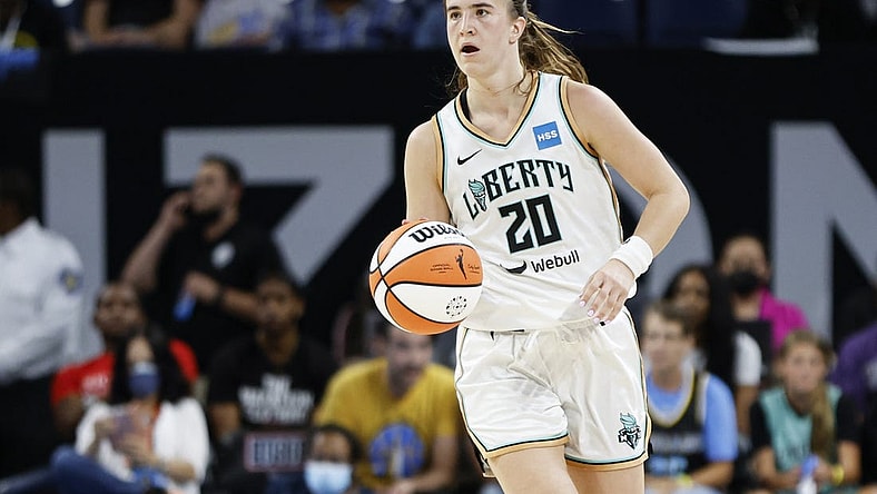 Aug 17, 2022; Chicago, Illinois, USA; New York Liberty guard Sabrina Ionescu (20) brings the ball up court against the Chicago Sky during the second half of game one of the first round of the WNBA playoffs at Wintrust Arena. Mandatory Credit: Kamil Krzaczynski-USA TODAY Sports