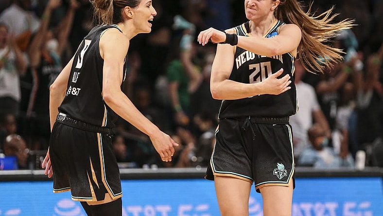Aug 23, 2022; Brooklyn, New York, USA; New York Liberty guard Sabrina Ionescu (20) celebrates with guard Rebecca Allen (9) after making a three point shot in the fourth quarter against the Chicago Sky at Barclays Center. Mandatory Credit: Wendell Cruz-USA TODAY Sports