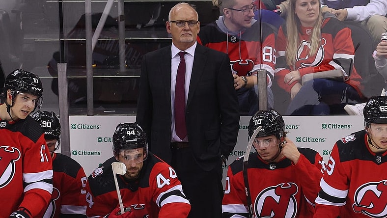 Oct 15, 2022; Newark, New Jersey, USA; New Jersey Devils head coach Lindy Ruff watches the action against the Detroit Red Wings during the third period at Prudential Center. Mandatory Credit: Ed Mulholland-USA TODAY Sports