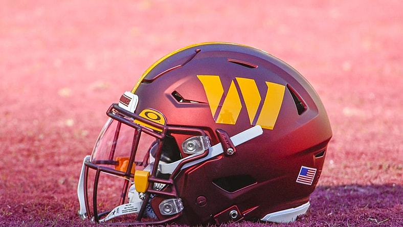 Jan 1, 2023; Landover, Maryland, USA; Washington Commanders helmet on the field before the game against the Cleveland Browns at FedExField. Mandatory Credit: Brad Mills-USA TODAY Sports