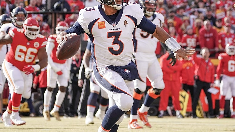 Jan 1, 2023; Kansas City, Missouri, USA; Denver Broncos quarterback Russell Wilson (3) throws a pass against the Kansas City Chiefs during a game at GEHA Field at Arrowhead Stadium. Mandatory Credit: Denny Medley-USA TODAY Sports