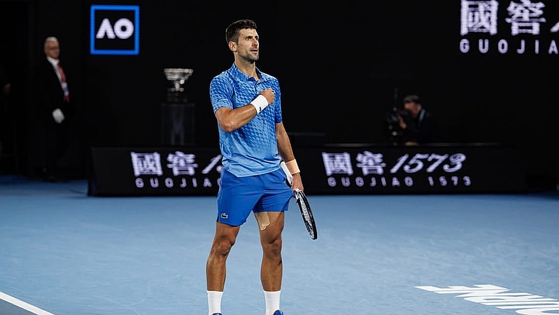 Jan 29, 2023; Melbourne, Victoria, Australia; Novak Djokovic of Serbia celebrates his victory over Stefanos Tsitsipas of Greece in the men's final on day fourteen of the 2023 Australian Open tennis tournament at Melbourne Park. Mandatory Credit: Mike Frey-USA TODAY Sports