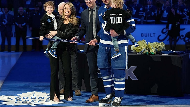 Jan 29, 2023; Toronto, Ontario, CAN; Toronto Maple Leafs center John Tavares (91) receives a commemorative hockey stick from Toronto Maple Leafs General Manager Kyle Dubas for his1000th NHL game ceremony against the Washington Capitals at Scotiabank Arena. Mandatory Credit: Nick Turchiaro-USA TODAY Sports