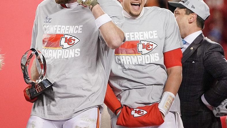Jan 29, 2023; Kansas City, Missouri, USA; Kansas City Chiefs quarterback Patrick Mahomes (15) and tight end Travis Kelce (87) celebrate after winning the AFC Championship game against the Cincinnati Bengals at GEHA Field at Arrowhead Stadium. Mandatory Credit: Denny Medley-USA TODAY Sports
