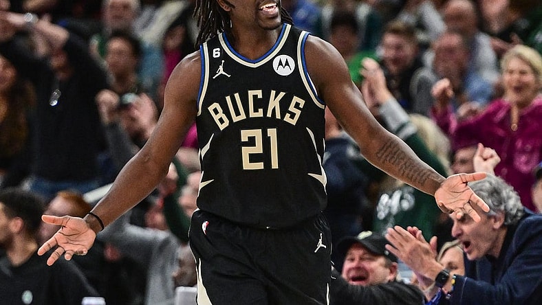 Feb 14, 2023; Milwaukee, Wisconsin, USA; Milwaukee Bucks guard Jrue Holiday (21) reacts after scoring a basket in the fourth quarter during game against the Boston Celtics at Fiserv Forum. Mandatory Credit: Benny Sieu-USA TODAY Sports