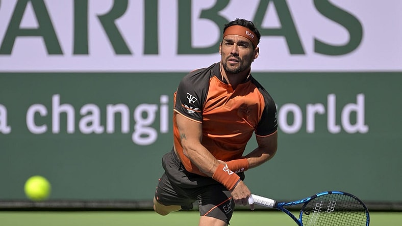 Mar 9, 2023; Indian Wells, CA, USA;  Fabio Fognini  (ITA) serves during his first round match against Ben Shelton (not pictured) on day 4 of the BNP Paribas Open at the Indian Wells Tennis Garden. Mandatory Credit: Jayne Kamin-Oncea-USA TODAY Sports