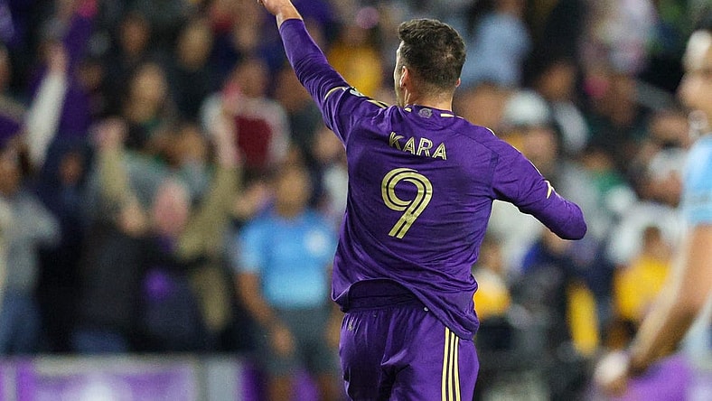 Mar 15, 2023; Orlando, FL, USA;  Orlando City SC forward Ercan Kara (9) celebrates after scoring a goal against Tigres UANL in the second half during the CONCACAF Champions League at Exploria Stadium. Mandatory Credit: Nathan Ray Seebeck-USA TODAY Sports