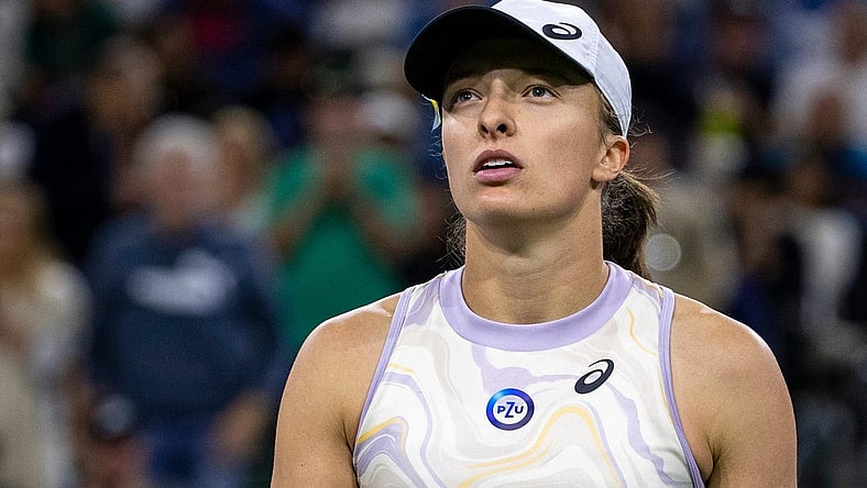 Iga Swiatek of Poland looks up to the chair umpire after losing to Elena Rybakina of Kazakhstan in their semifinal match at the BNP Paribas Open at the Indian Wells Tennis Garden in Indian Wells, Calif., Friday, March 17, 2023.