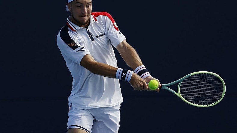 Mar 21, 2023; Miami, Florida, US; Jan-Lennard Struff (BEL) hits a backhand against Zhizhen Zhang (CHN) (not pictured) on day two of the Miami Open at Hard Rock Stadium. Mandatory Credit: Geoff Burke-USA TODAY Sports