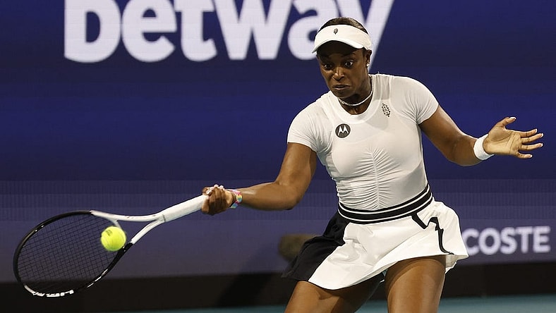 Mar 22, 2023; Miami, Florida, US; Sloane Stephens (USA) hits a forehand against Shelby Rogers (USA) (not pictured) on day three of the Miami Open at Hard Rock Stadium. Mandatory Credit: Geoff Burke-USA TODAY Sports