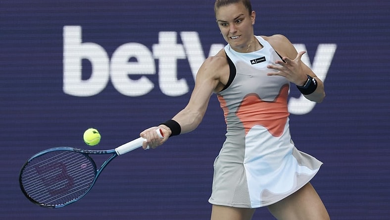 Mar 24, 2023; Miami, Florida, US; Maria Sakkari (GRE) hits a forehand against Bianca Andreescu (CAN) (not pictured) on day five of the Miami Open at Hard Rock Stadium. Mandatory Credit: Geoff Burke-USA TODAY Sports
