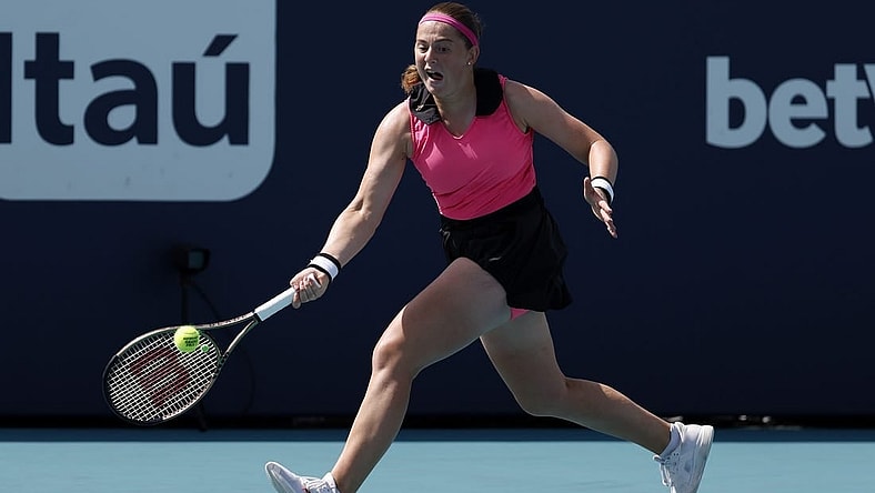 Mar 27, 2023; Miami, Florida, US; Jelena Ostapenko (LAT) hits a forehand against Martina Trevisan (ITA) (not pictured) on day eight of the Miami Open at Hard Rock Stadium. Mandatory Credit: Geoff Burke-USA TODAY Sports