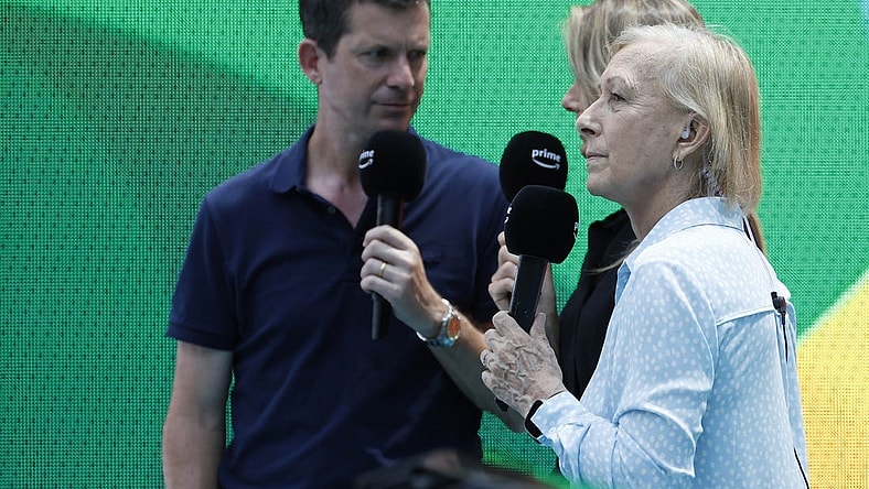 Mar 29, 2023; Miami, Florida, US; Martina Navratilova (R) does a tv hit for PrimeTV with co-presenters Tim Henman (L) and Daniela Hantuchova (M) during a stoppage between sets in the match between Sorana Cirstea (ROU)  and Aryna Sabalenka (both not pictured) in a women's singles quarterfinal on day ten of the Miami Open at Hard Rock Stadium. Mandatory Credit: Geoff Burke-USA TODAY Sports