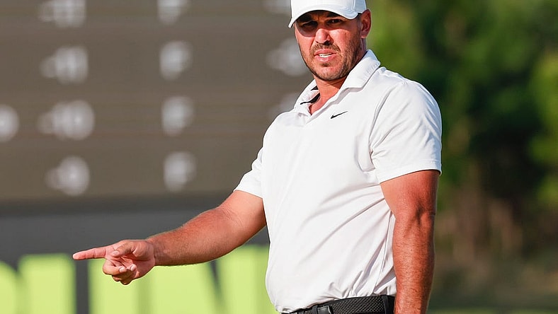Apr 2, 2023; Orlando, Florida, USA; Brooks Koepka of the Smash golf club on the 18th green during the final round of a LIV Golf event at Orange County National. Mandatory Credit: Reinhold Matay-USA TODAY Sports