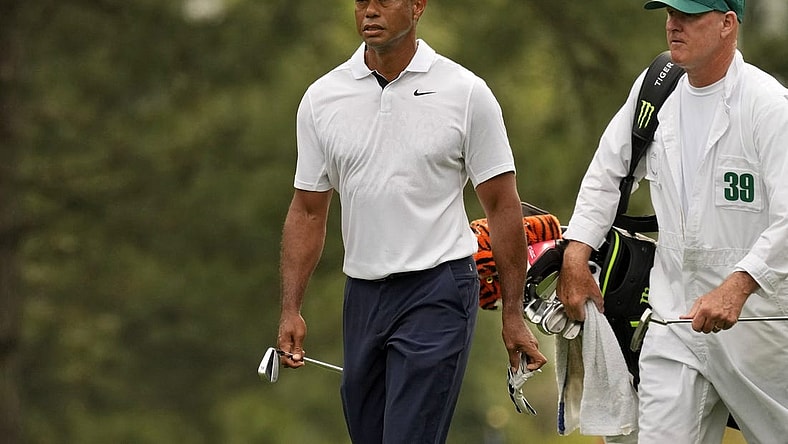 Apr 6, 2023; Augusta, Georgia, USA; Tiger Woods walks on the first fairway with caddie Joe LaCava during the first round of The Masters golf tournament. Mandatory Credit: Michael Madrid-USA TODAY Network

Pga Masters Tournament First Round