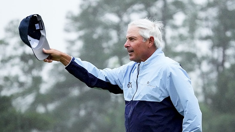 Apr 8, 2023; Augusta, Georgia, USA; Fred Couples waves to patrons from the 18th green during the second round of The Masters golf tournament. Mandatory Credit: Rob Schumacher-USA TODAY Network
