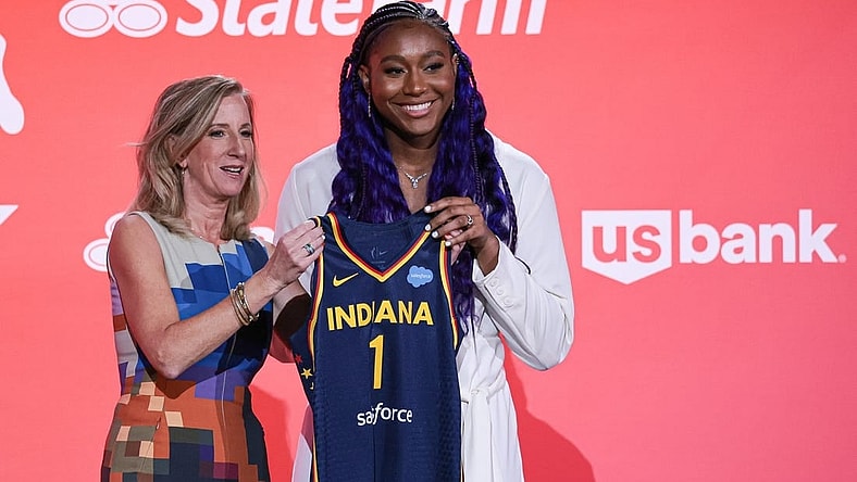 Apr 10, 2023; New York, NY, USA; Aliyah Boston poses for a photo with WNBA Commissioner Cathy Engelbert after being drafted first overall by the Indiana Fever during WNBA Draft 2023 at Spring Studio. Mandatory Credit: Vincent Carchietta-USA TODAY Sports