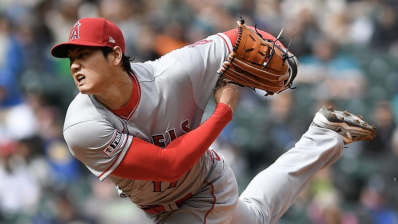 Apr 5, 2023; Seattle, Washington, USA; Los Angeles Angels starting pitcher Shohei Ohtani (17) throws a pitch against the Seattle Mariners during the fifth inning at T-Mobile Park. Mandatory Credit: Michael Thomas Shroyer-USA TODAY Sports