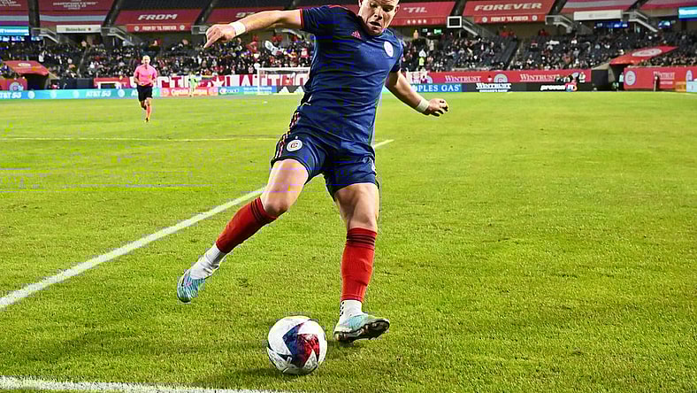 Apr 8, 2023; Chicago, Illinois, USA;  Chicago Fire FC forward Chris Mueller (8) controls the ball against Minnesota United at Soldier Field. Mandatory Credit: Jamie Sabau-USA TODAY Sports