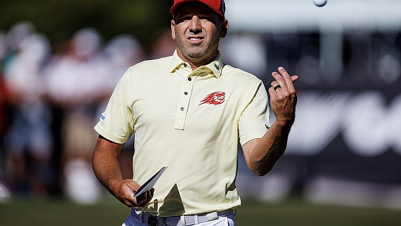 Apr 21, 2023; Adelaide, South Australia AUS; Sergio Garcia of team Fireballs throw a ball to the crowd during the first round of LIV Golf Adelaide golf tournament at Grange Golf Club. Mandatory Credit: Mike Frey-USA TODAY Sports