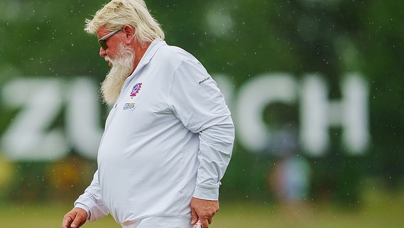 Apr 21, 2023; Avondale, Louisiana, USA; John Daly walks the 18th green during the second round of the Zurich Classic of New Orleans golf tournament. Mandatory Credit: Andrew Wevers-USA TODAY Sports