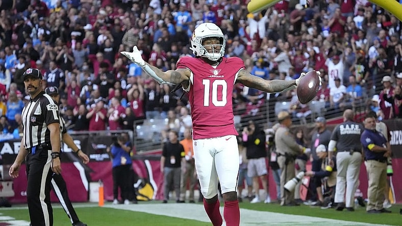 Arizona Cardinals wide receiver DeAndre Hopkins (10) celebrates after a touchdown catch against the Los Angeles Chargers during the first quarter at State Farm Stadium in Glendale on Nov. 27, 2022.
Syndication Arizona Republic