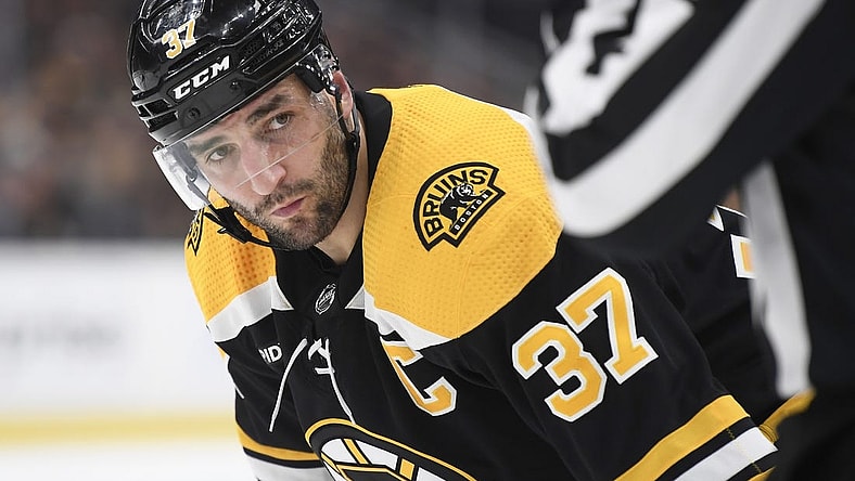Apr 26, 2023; Boston, Massachusetts, USA; Boston Bruins center Patrice Bergeron (37) gets ready for a face-off during the first period in game five of the first round of the 2023 Stanley Cup Playoffs against the Florida Panthers at TD Garden. Mandatory Credit: Bob DeChiara-USA TODAY Sports