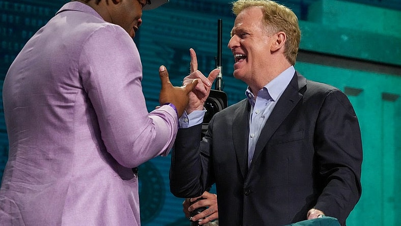 Apr 27, 2023; Kansas City, MO, USA; Georgia defensive lineman Jalen Carter reacts with NFL commissioner Roger Goodell after being selected by the Philadelphia Eagles ninth overall in the first round of the 2023 NFL Draft at Union Station. Mandatory Credit: Kirby Lee-USA TODAY Sports