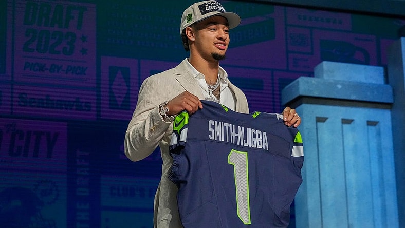 Apr 27, 2023; Kansas City, MO, USA; Ohio State wide receiver Jaxon Smith-Njigba on stage after being selected by the Seattle Seahawks twentieth overall in the first round of the 2023 NFL Draft at Union Station. Mandatory Credit: Kirby Lee-USA TODAY Sports